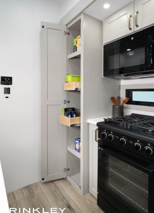 | Model Gx Toy Hauler Line 75 Large Fifth Wheel RV Pantry w/ Appliance Outlets and Drawers