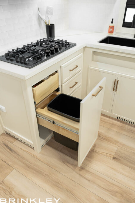 | Model I 294 Travel Trailers 12 A Large Pull-Out Trash Bin si one of many things that Makes for the Best Travel Trailer RV Interiors and Kitchen Spaces.