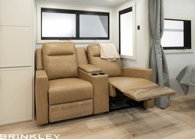 | Model I 235 Travel Trailers 18 The Brinkley Model I 235 Luxury Travel Trailer features premium Thomas Payne Seismic Series theater seating. Unlike other manufacturers that often use standard stock vinyl, Brinkley upgrades to heavy-duty materials designed for longevity. This commitment to quality ensures your furniture withstands heavier use and stays comfortable for the long haul.