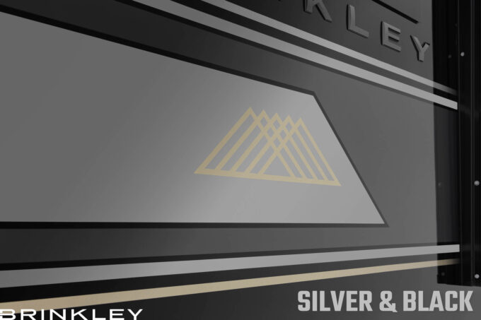 | Model G Fifth Wheel Toy Hauler Line 16 Model G Fifth Wheels Premium Exterior Silver Black Full Body Paint Mountains 2026 Brinkley RV 0154L