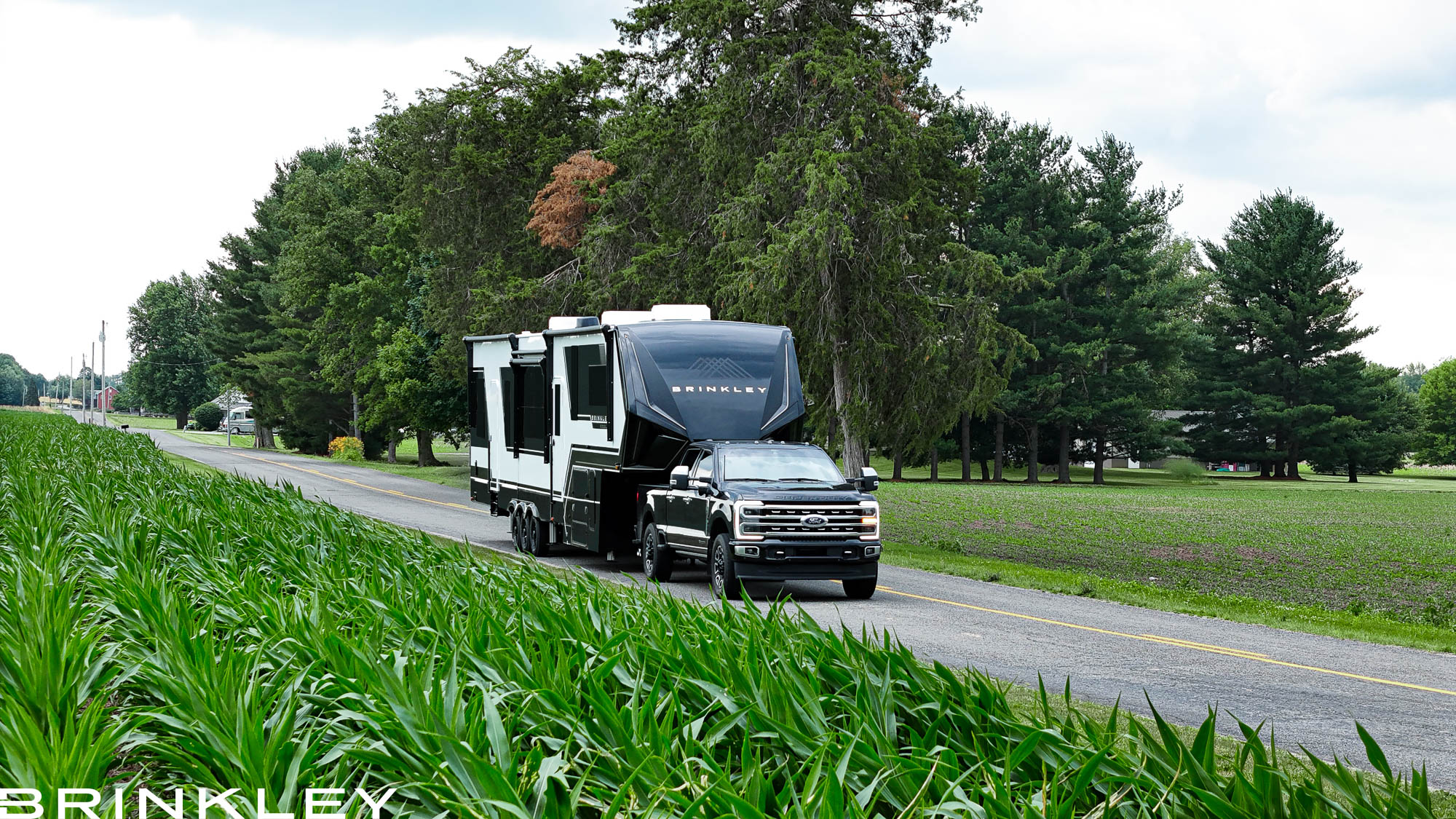 | Model G Fifth Wheel Toy Hauler Line 115 Brinkley Model G Luxury Fifth Wheel Toy Hauler in Premium Exterior w/ White & Black Paint